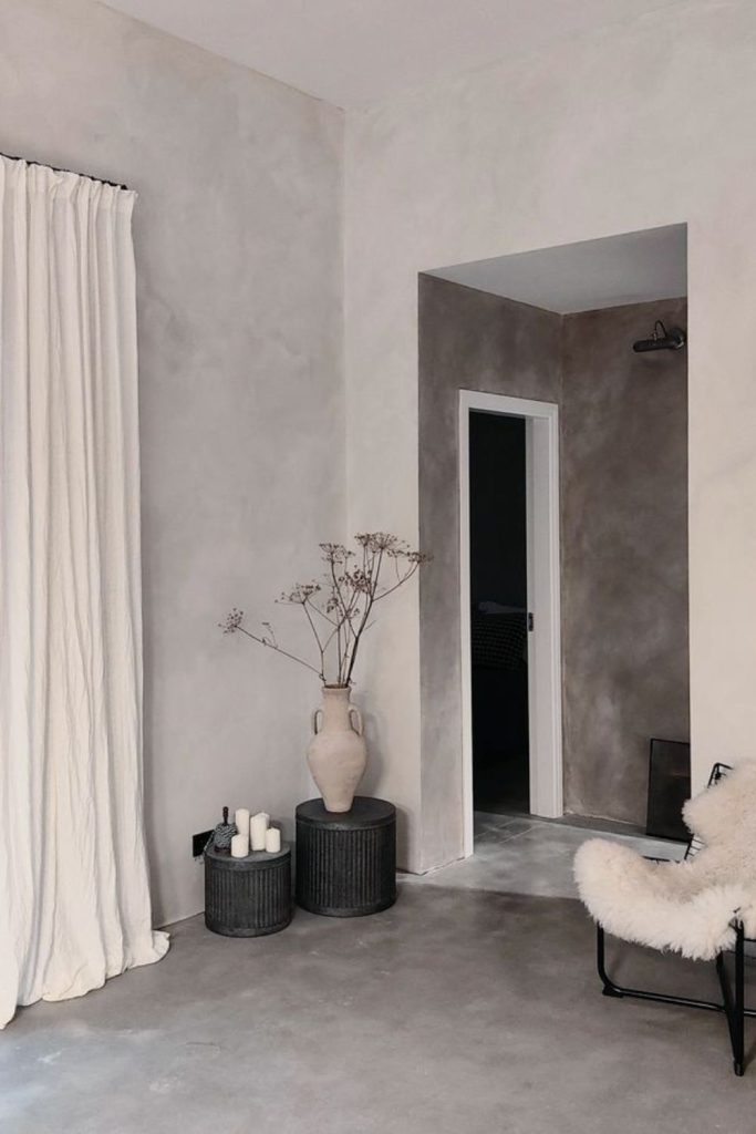 Chalk white textured limewash wall.