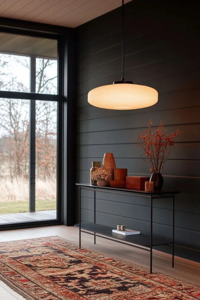 Charcoal shiplap statement wall with furnishings.