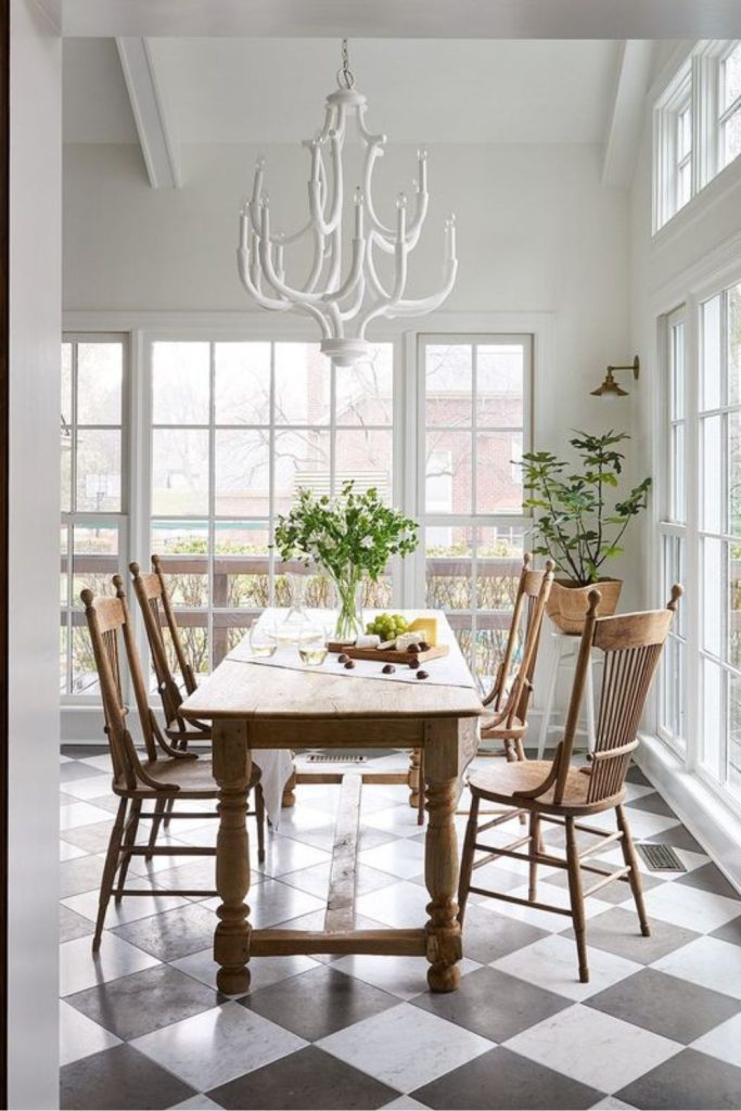 Relaxed cream gray sunroom flooring.