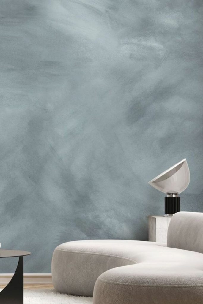 Coastal blue-gray limewash bedroom wall.