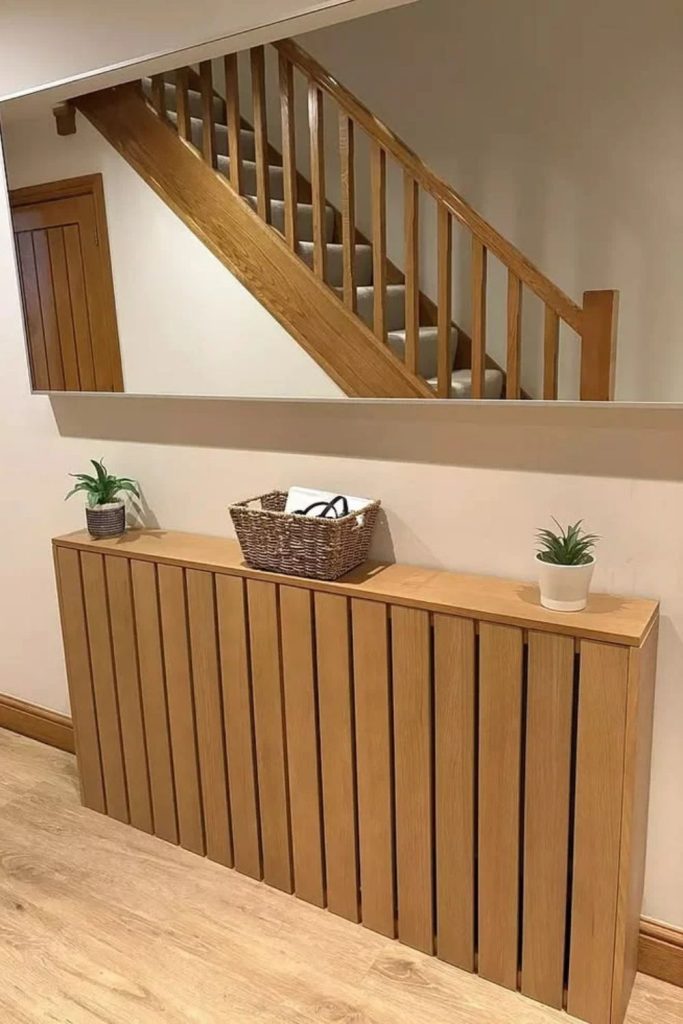 Contemporary oak slatted radiator cover.