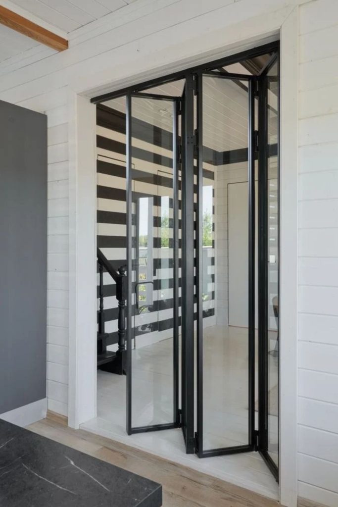 Folding Crittall glass door wall