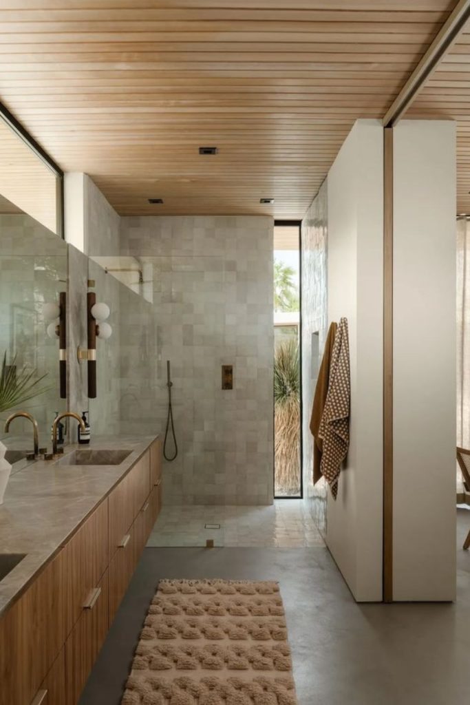 Modern desert-inspired powder room interior.