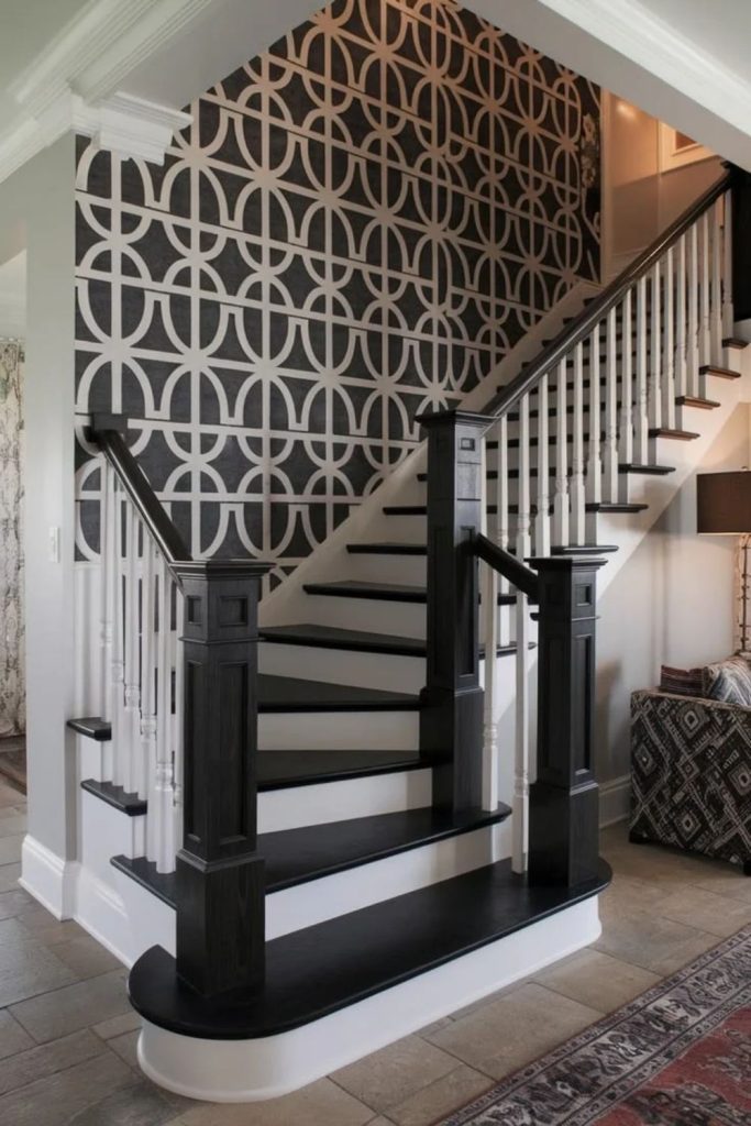Dramatic botanical wallpaper staircase makeover design.