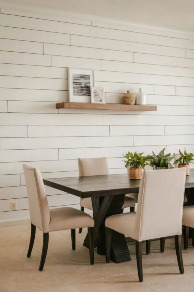 Elegant dining room shiplap feature wall.