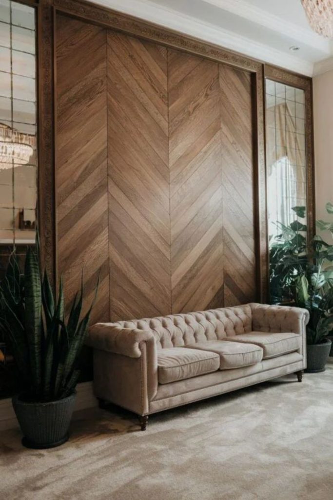 Herringbone timber wall panel design.