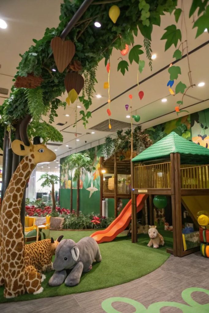 Lush jungle-themed indoor playroom.