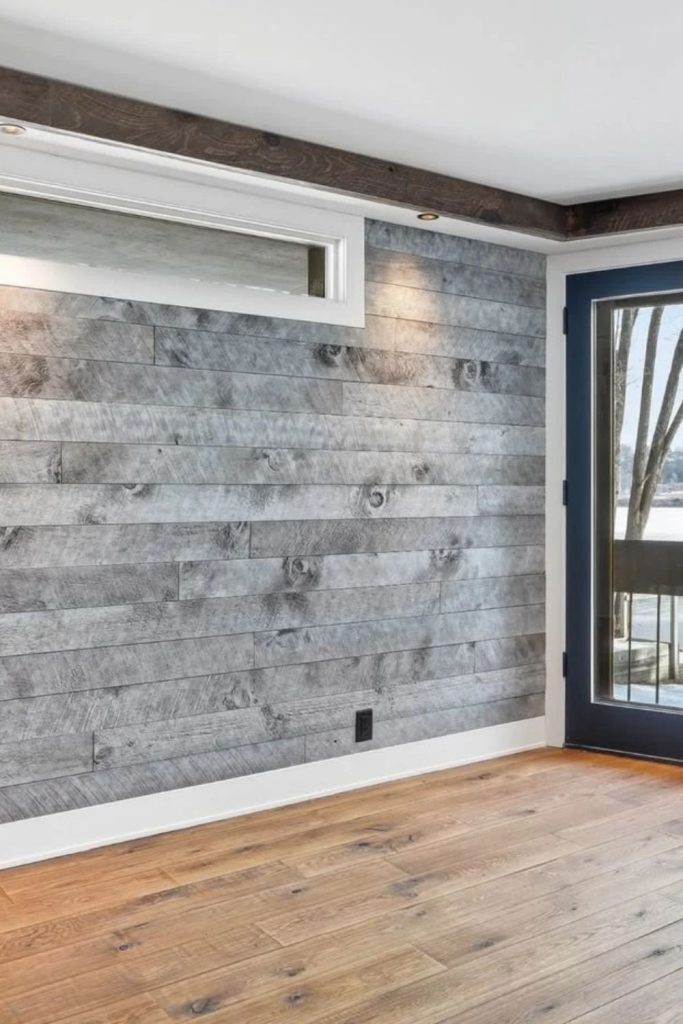 Industrial gray shiplap wall with decor.
