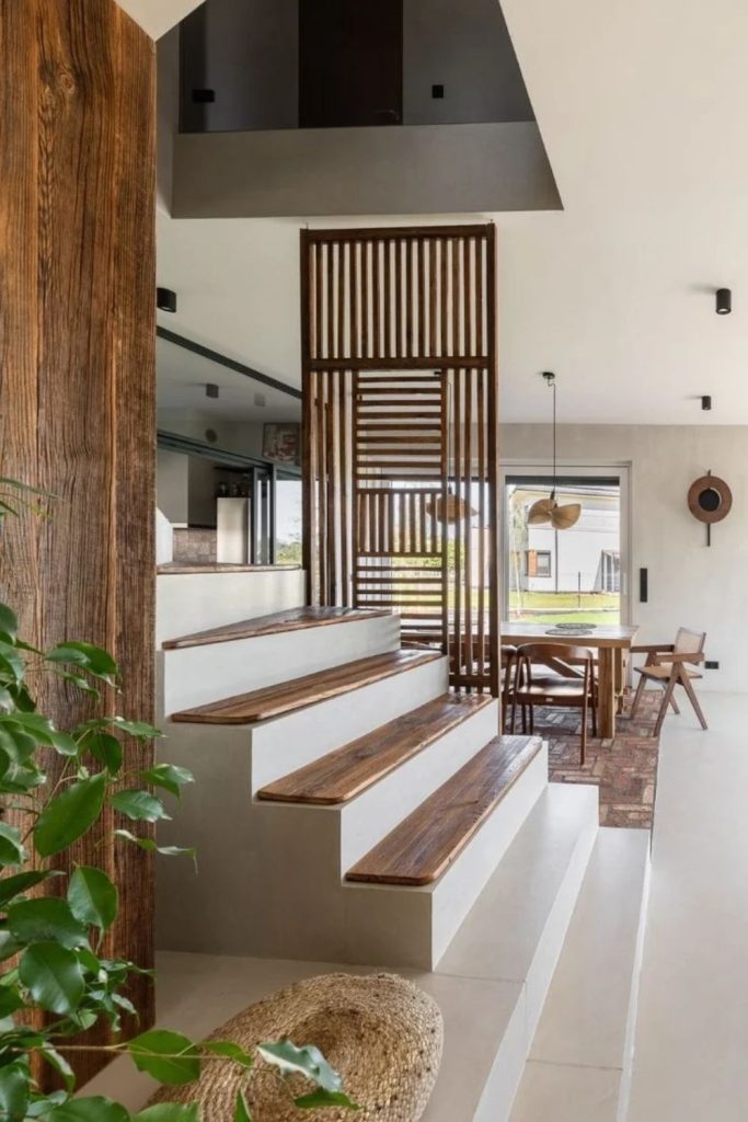 Japandi staircase with warm timber steps.