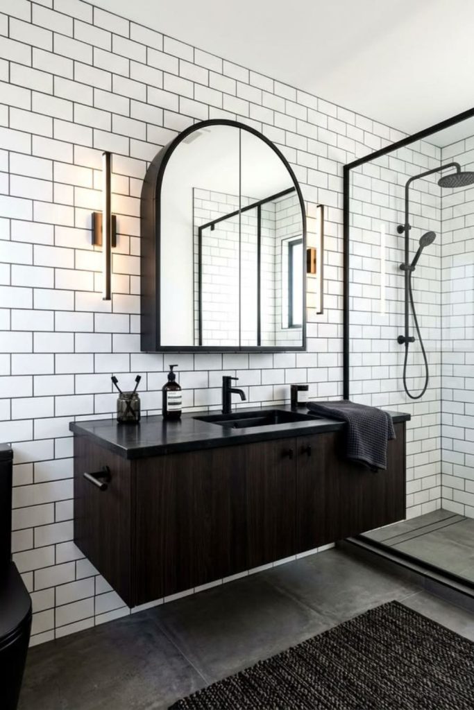 Stylish monochrome ensuite bathroom design.