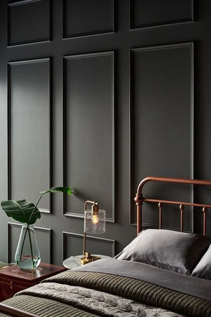 Moody charcoal raised panel walls