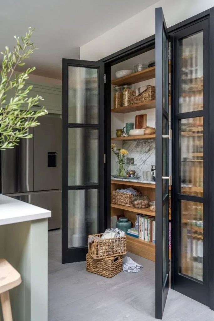 Natural linen larder with woven baskets.