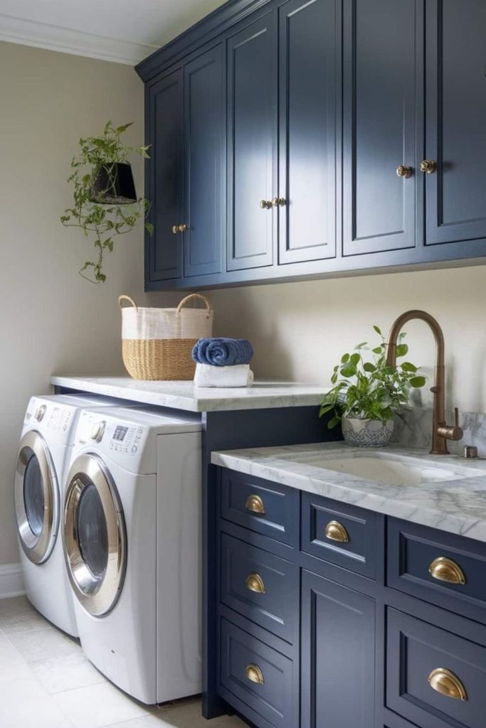 Navy blue utility room cabinetry.