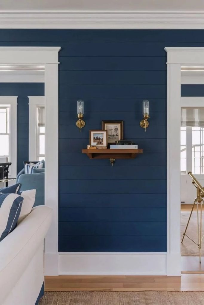 Navy nautical shiplap wall with decor.