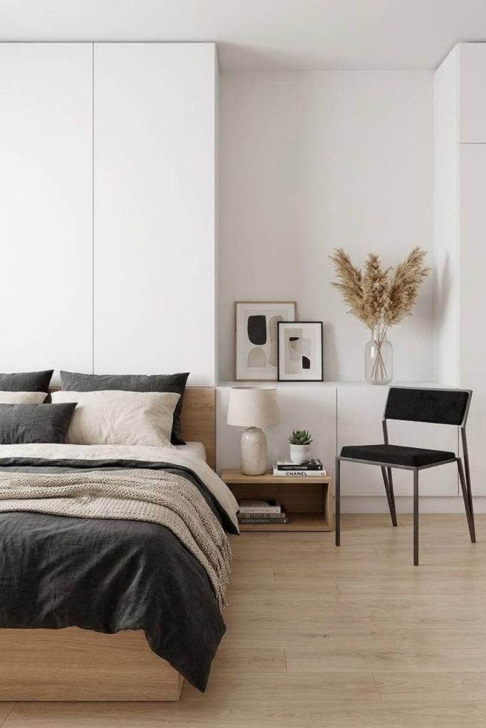 Nordic monochrome bedroom with charcoal accents.