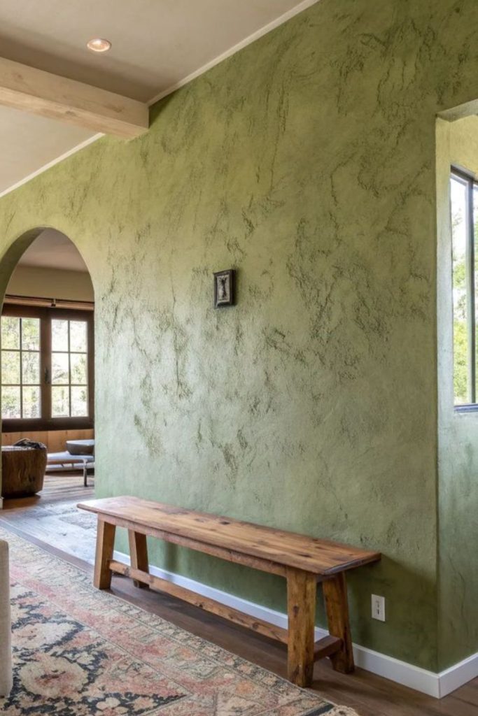 Olive taupe sophisticated limewash wall.