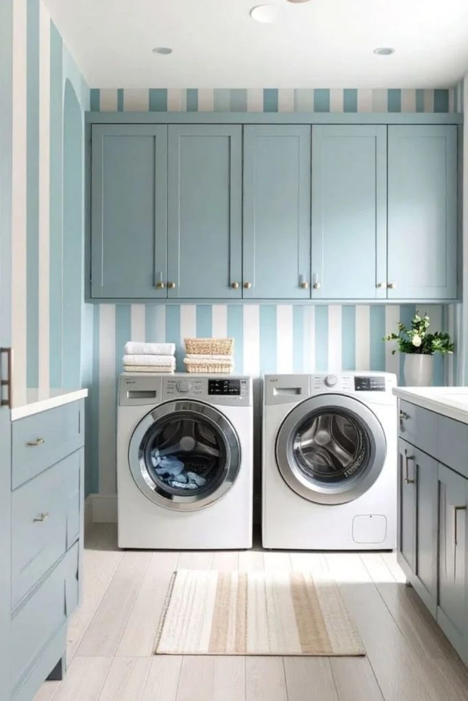 Pastel blue laundry room corner.