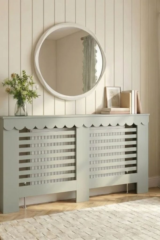 Soft sage green radiator cover.