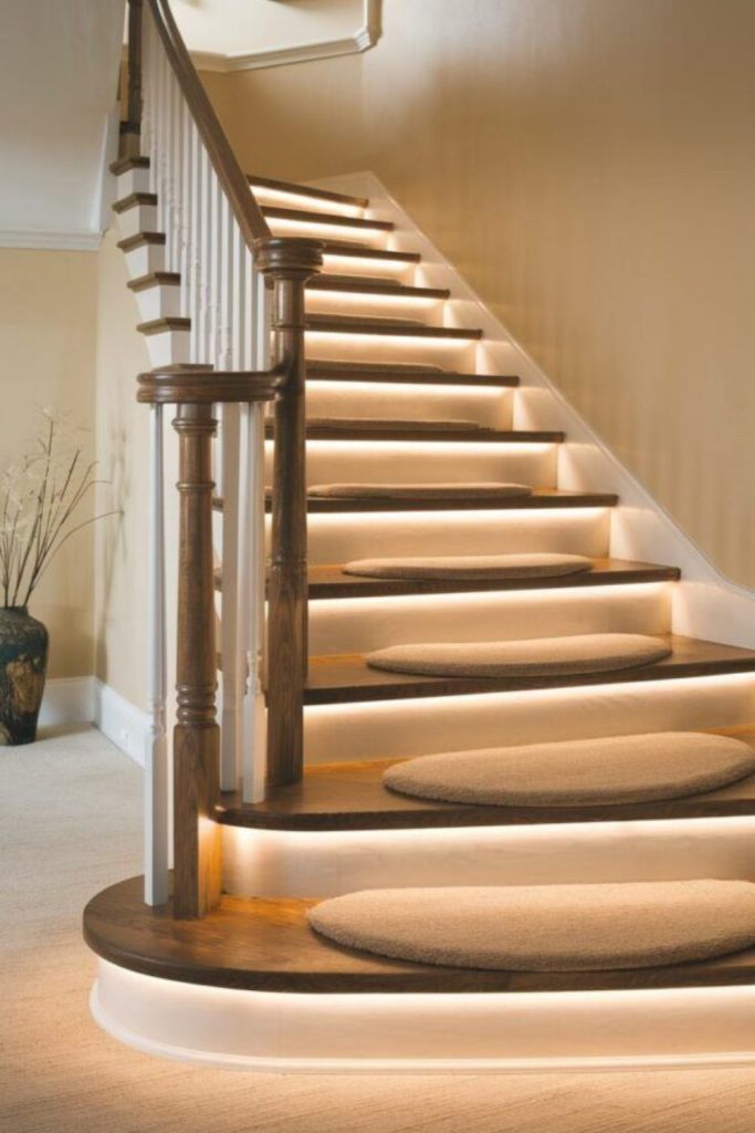 Warmly lit staircase with glowing steps.