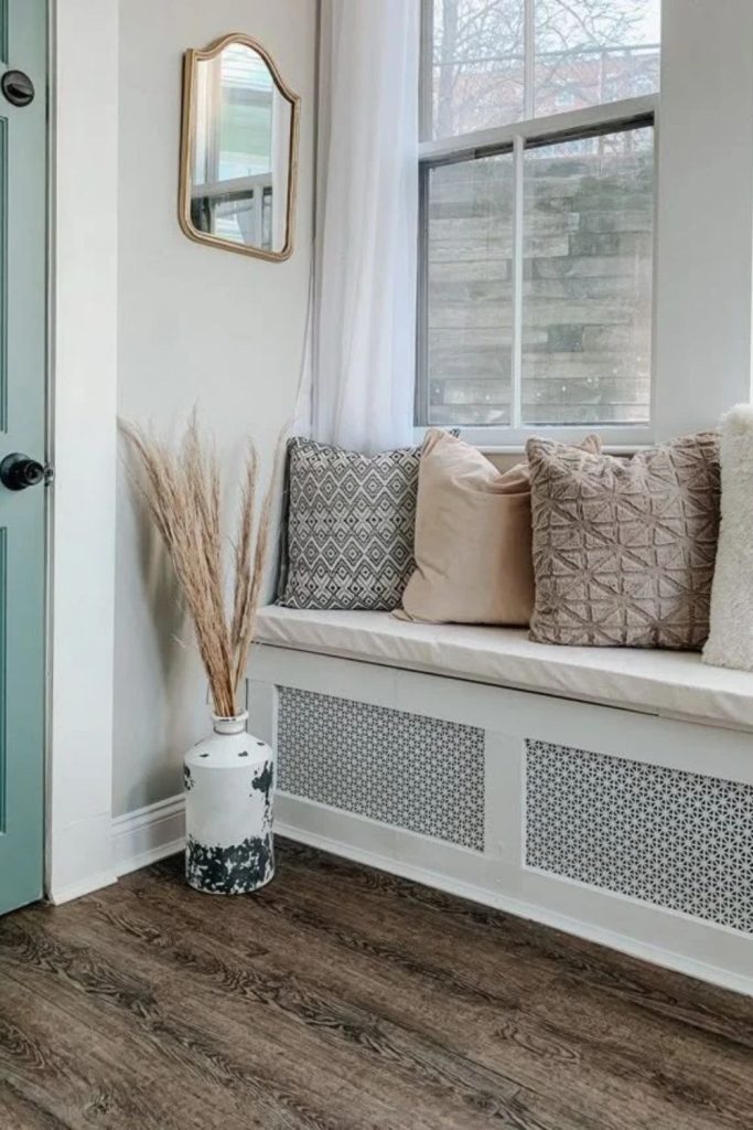 Cozy window seat radiator cover.