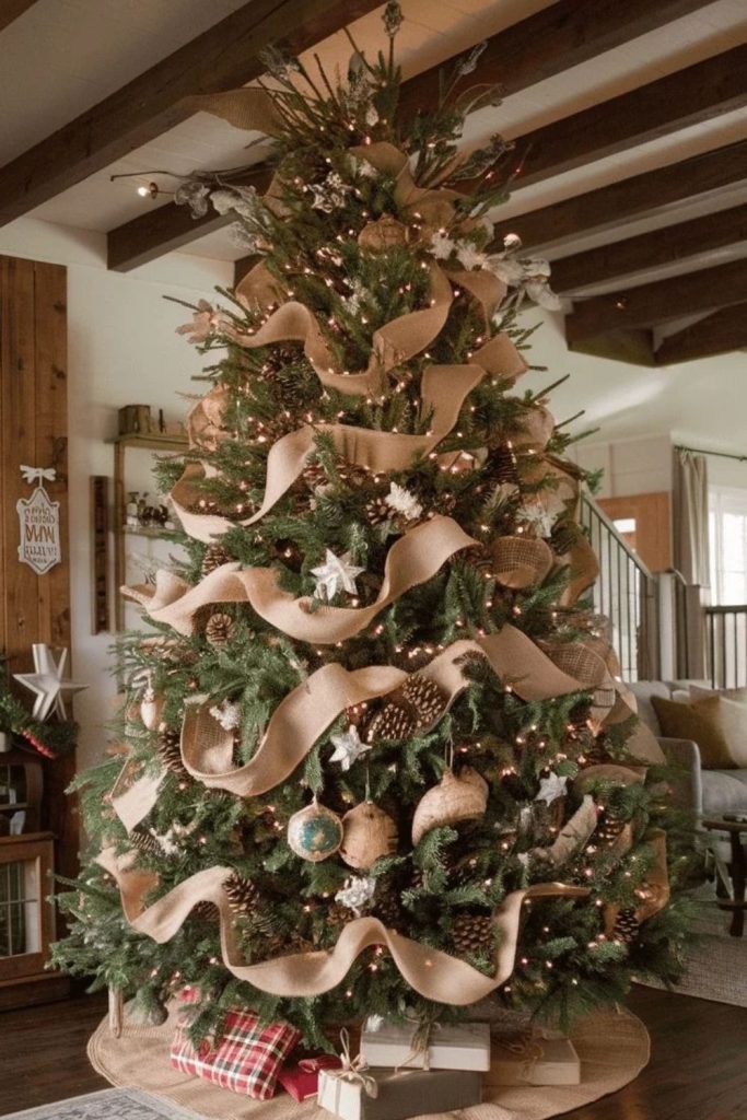 Burlap ribbon Christmas tree with wooden ornaments.