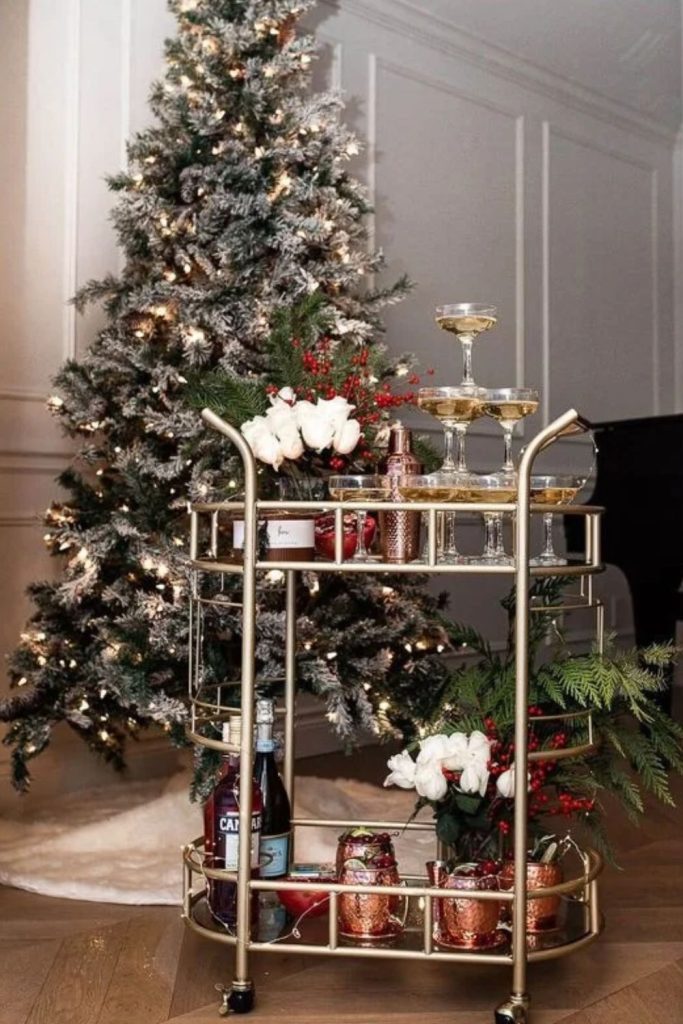 Christmas movie night bar cart with festive snacks.