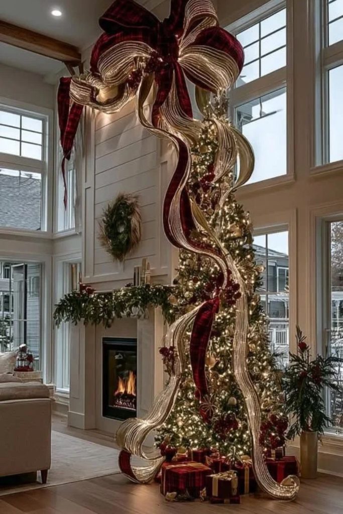 Christmas tree decorated with oversized velvet bows.