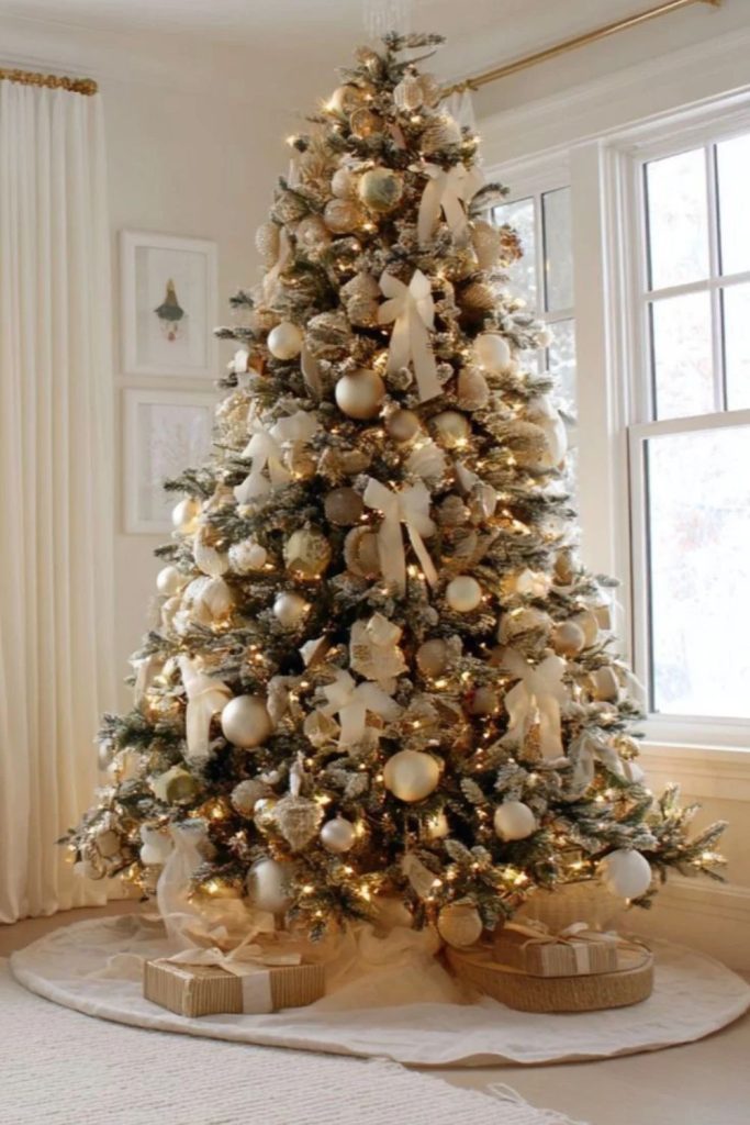 Elegant champagne Christmas tree with golden accents.
