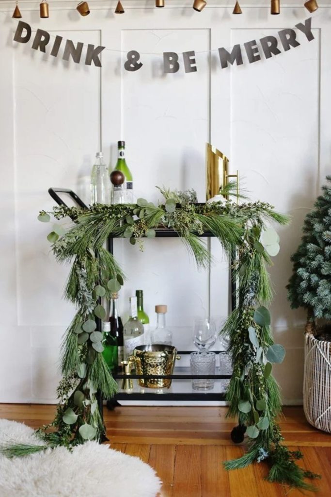 Emerald Christmas bar cart with elegant golden details.
