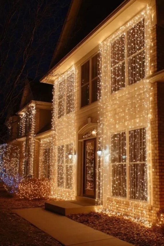 Curtain lights creating glowing outdoor wall backdrops.