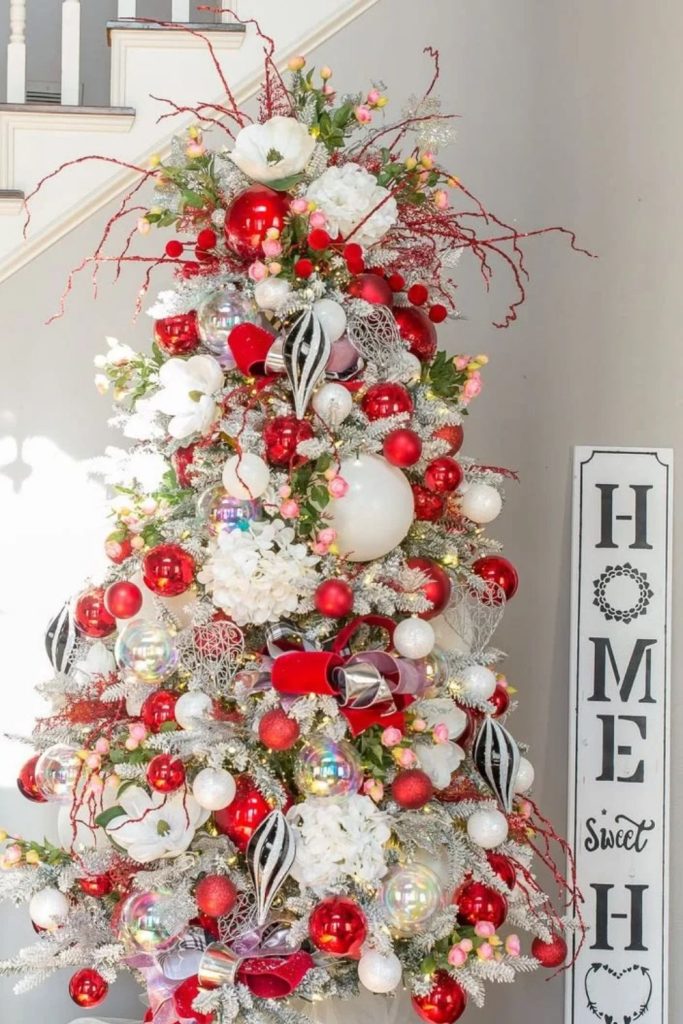 Handmade Christmas tree with personalized festive ornaments.