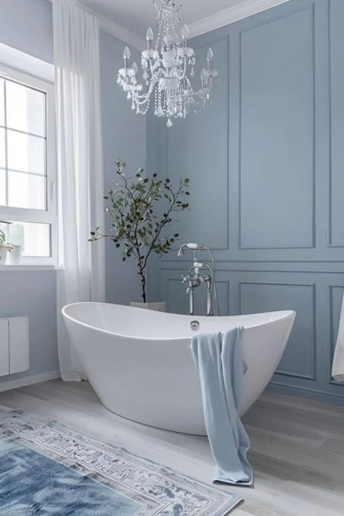 Icy blue refreshing colour drenched bathroom.