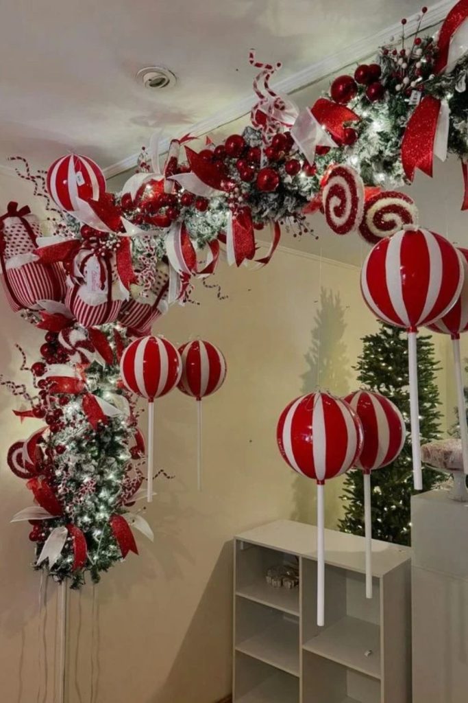 Peppermint Christmas garland with candy decorations.