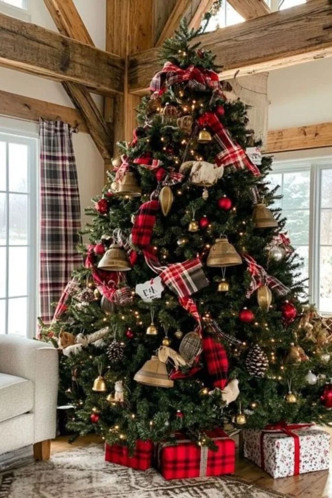Rustic bell and berry flocked Christmas tree.