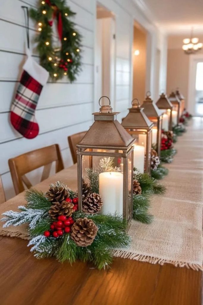 Rustic Christmas lantern centerpiece with evergreen branches.