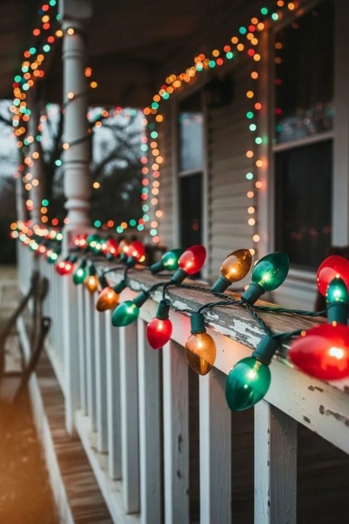 Traditional red and green Christmas lights outdoors.