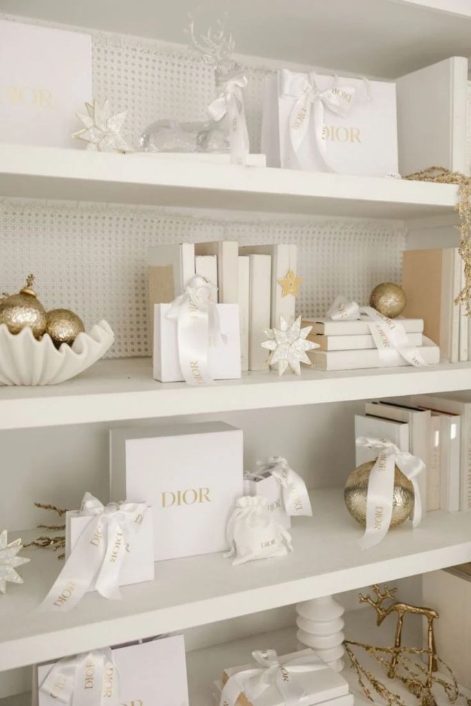 White Christmas gift wrapping with elegant satin ribbons.