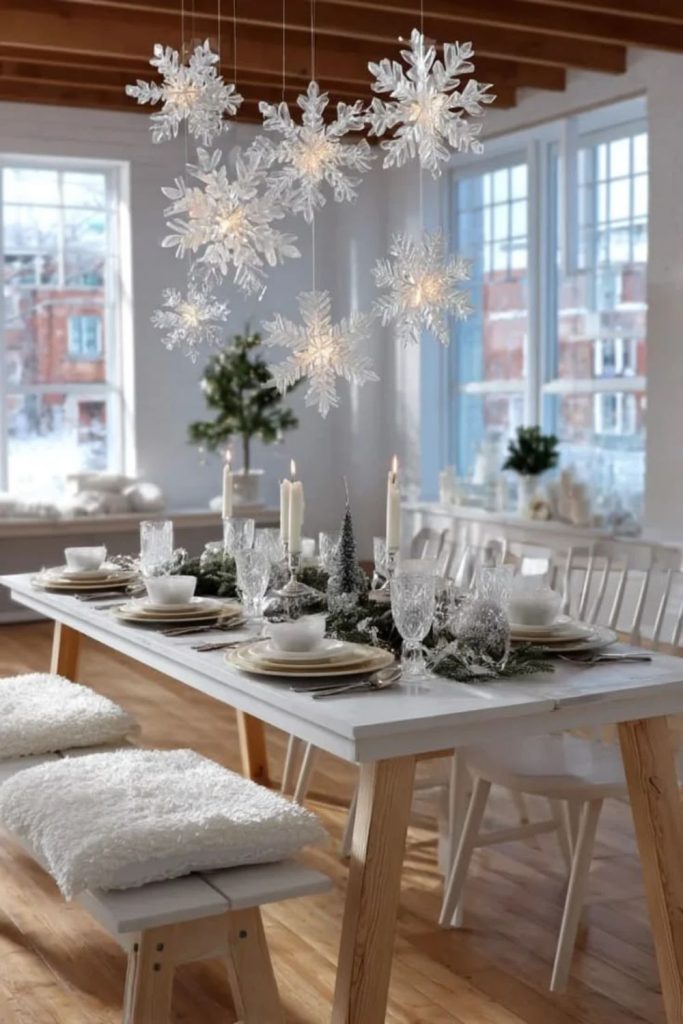 Winter white dining table with elegant festive settings.
