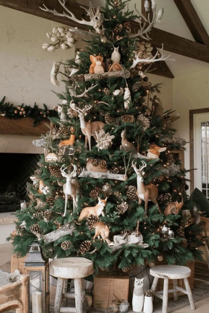 Woodland animal flocked Christmas tree with forest ornaments.
